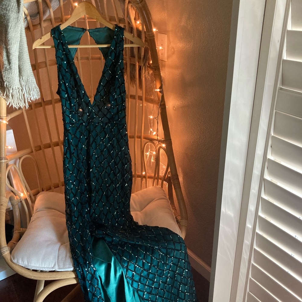 Elegant in Emerald. This dress is a size medium and has only been worn twice.